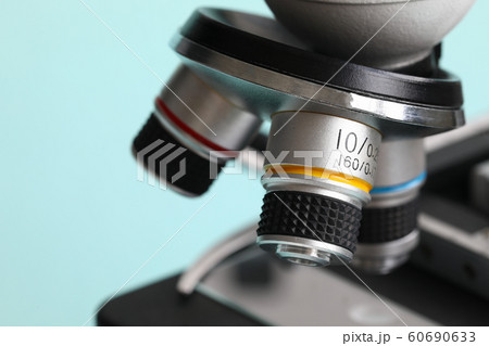 Chemistry microscope on modern blue background Chemistry microscope on modern blue background 60690633