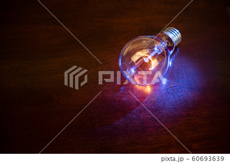 light bulb on dark background light bulb on dark background 60693639