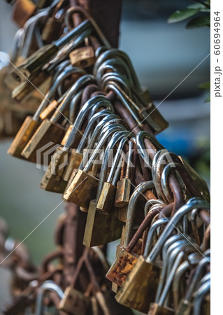 Padlocks along trail on Huashan Mountain Padlocks along trail on Huashan Mountain 60694964