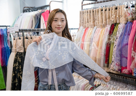 Holidays and tourism concept, group of smiling friends traveling in Seoul, Korea 254 Holidays and tourism concept, group of smiling friends traveling in Seoul, Korea 254 60699587