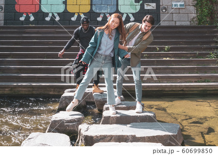 Holidays and tourism concept, group of smiling friends traveling in Seoul, Korea 023 Holidays and tourism concept, group of smiling friends traveling in Seoul, Korea 023 60699850