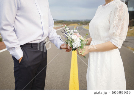 Happy young couple, camping or trip in Jeju, Korea 229 Happy young couple, camping or trip in Jeju, Korea 229 60699939
