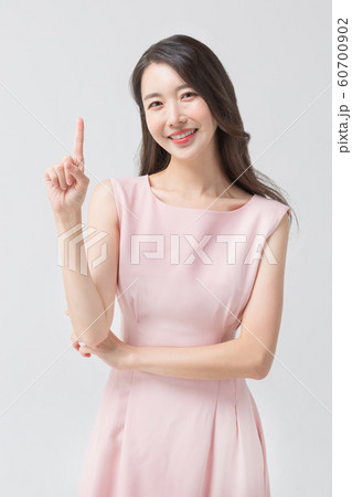 Happy single woman life, an attractive smiling woman holding shopping bags 335 Happy single woman life, an attractive smiling woman holding shopping bags 335 60700902