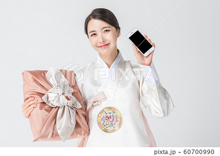 Happy single woman life, an attractive smiling woman holding shopping bags 195 Happy single woman life, an attractive smiling woman holding shopping bags 195 60700990