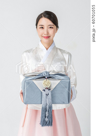 Happy single woman life, an attractive smiling woman holding shopping bags 223 Happy single woman life, an attractive smiling woman holding shopping bags 223 60701055