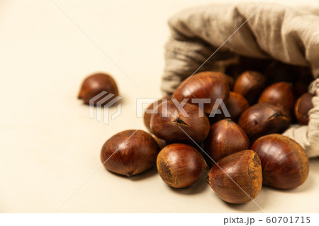 Autumn harvest time, fresh pumpkin and chestnut 036 60701715