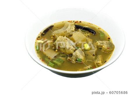 hot and spicy beef with tamarind and Thai herbs soup on bowl 60705686