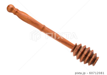 Honey wooden dipper isolated on white background with clipping path 60712081