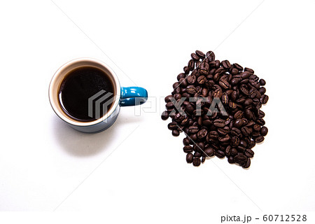 Blue cup of coffee by a pile of coffee beans 60712528