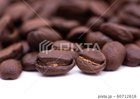 Close up of coffee beans on a white background 60712616