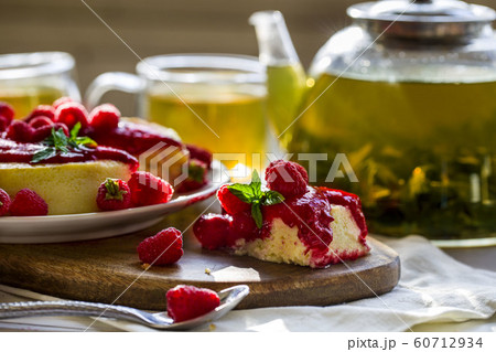 Cheesecake with raspberry sauce Cheesecake with raspberry sauce 60712934