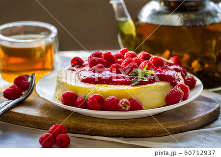 Cheesecake with raspberry sauce Cheesecake with raspberry sauce 60712937