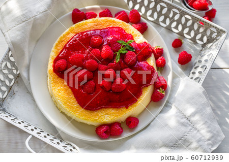 Cheesecake with raspberry sauce Cheesecake with raspberry sauce 60712939
