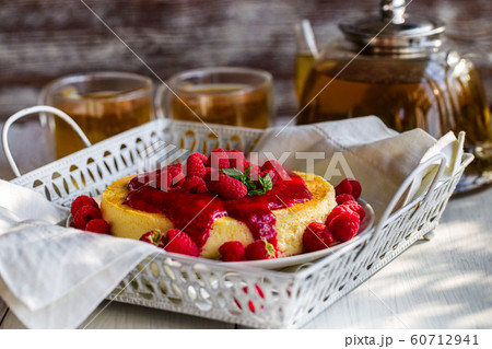 Cheesecake with raspberry sauce Cheesecake with raspberry sauce 60712941