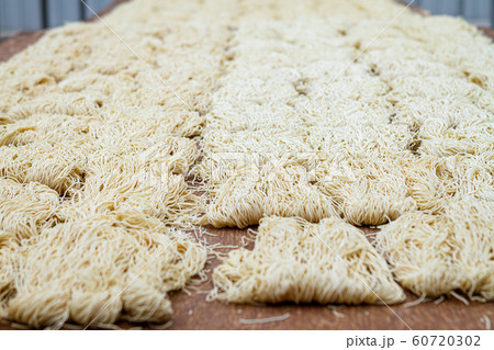 Yellow noodles or Mee Sua food drying in the Yellow noodles or Mee Sua food drying in the 60720302