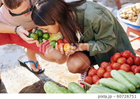 Couple smelling limes Couple smelling limes 60726751