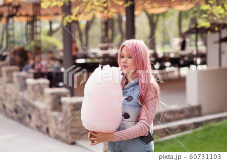 Portrait of a lovely pink-haired girl outdoors 60731103