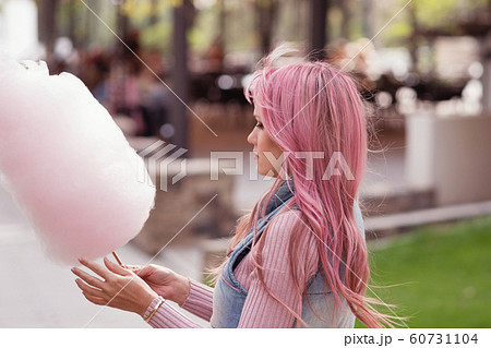 Portrait of a lovely pink-haired girl outdoors 60731104