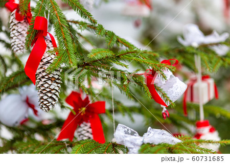 Ornaments on a Christmas tree. 60731685