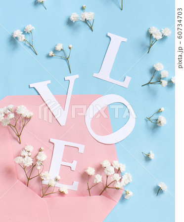 Flowers, pink envelope and word Love on a light Flowers, pink envelope and word Love on a light 60734703