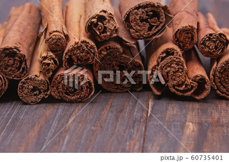 sticks of Ceylon cinnamon spice on thewooden table 60735401