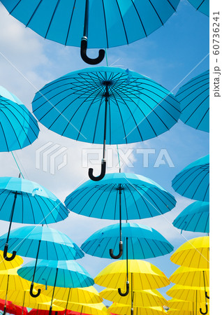 Outdoor art design and decor. Umbrellas float in 60736241