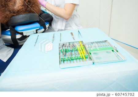 Tools for the periodontist.Scalers in stomatology.Multi-colored dental curettes. Curettes for dental fillings. Dental probes.Bilateral stomatologic probes. Dentistry. 60745702