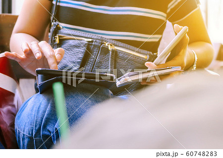 Woman Using a Smart Phone 60748283