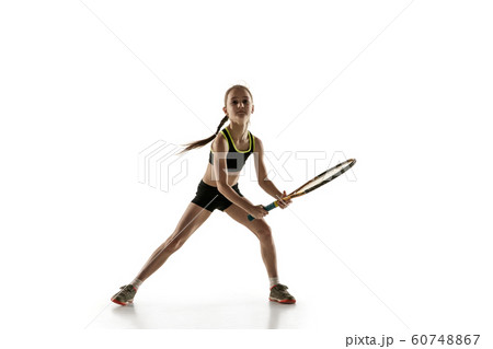 Little caucasian girl playing tennis isolated on white background Little caucasian girl playing tennis isolated on white background 60748867