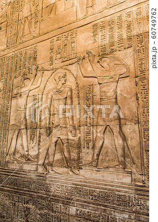 Ruins and Hieroglyphs in the famous Temple of Kom Ombo in Egypt on nile river bank Ruins and Hieroglyphs in the famous Temple of Kom Ombo in Egypt on nile river bank 60749762