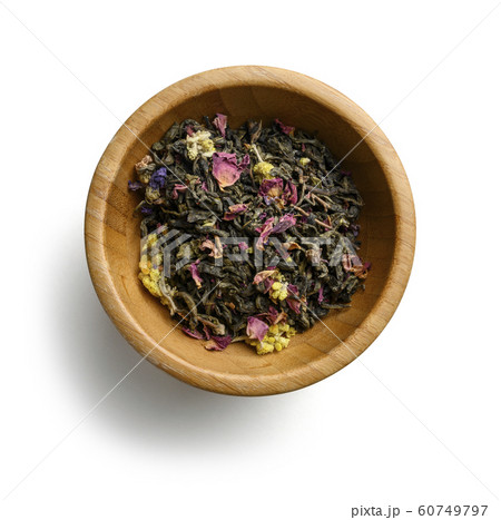 Green tea with aromatic additives. Top view on white background Green tea with aromatic additives. Top view on white background 60749797