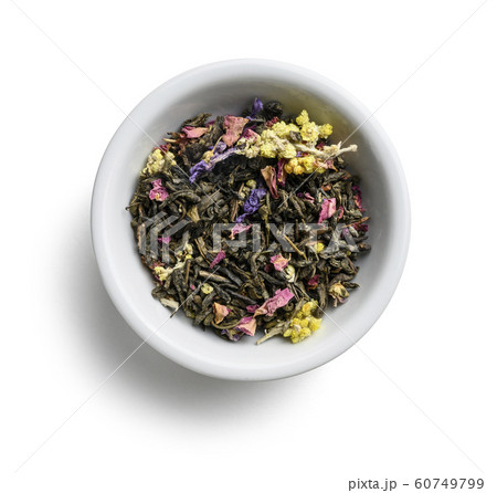 Green tea with aromatic additives. Top view on white background 60749799