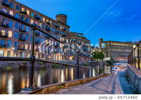 Evening view of riverside buildings 60753460