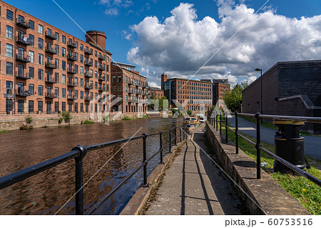Riverside path and industrial style apartment 60753516