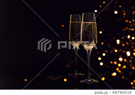 Glasses of champagne with black background 60760316