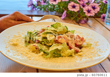 Served Caesar salad 60760611