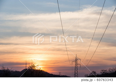 high voltage post,High voltage tower sky sunset 60763343