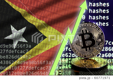 Timor Leste flag and rising green arrow on bitcoin 60771971