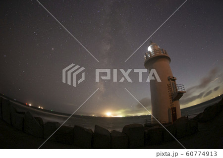 milky way with cape irago lighthouse 60774913