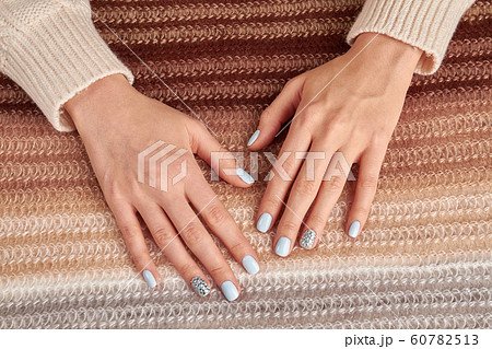 Fashion nails with rhinestones. Blue manicure. 60782513