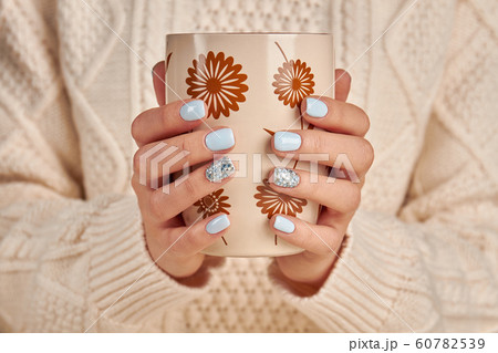 Trendy blue manicure. Trendy blue manicure. 60782539