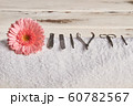 Beautiful pink gerbera with tools for manicure and 60782567