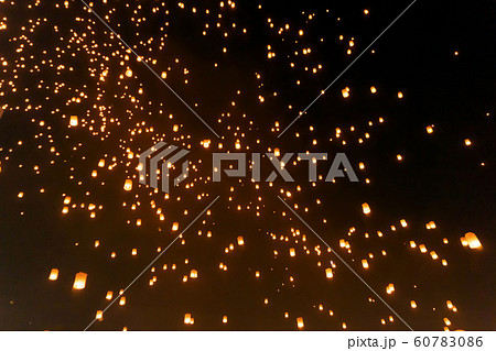 Thai people release sky floating lanterns or lamp Thai people release sky floating lanterns or lamp 60783086