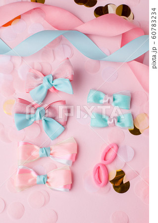 Cute kids hair claws on pink background. Hair 60783234