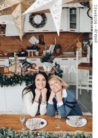 Happy mother and daughter staying together in the Happy mother and daughter staying together in the 60784431