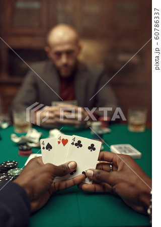 Male hands with cards, poker, games of chance Male hands with cards, poker, games of chance 60786337