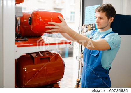 Plumber choosing expansion tank for water pump Plumber choosing expansion tank for water pump 60786686