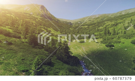 Aerial Drone Flight beautiful mountain landscape Aerial Drone Flight beautiful mountain landscape 60787379