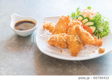 fried fish with tonkatsu sauce 60790422