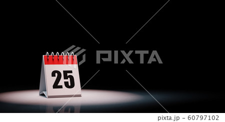 Calendar Spotlighted on Black Background, Day 25 60797102